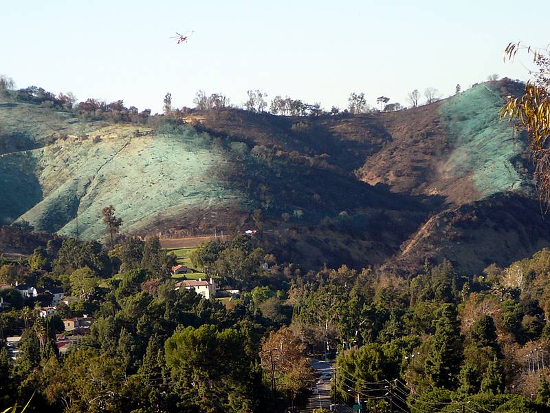 poison green hydromulch being sprayed in