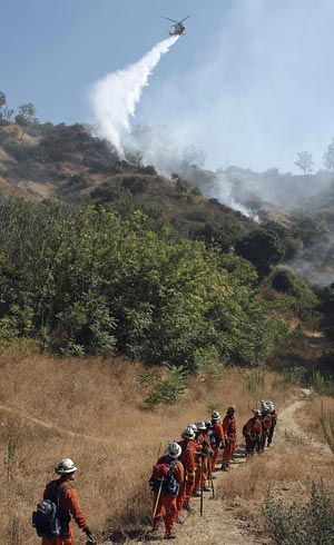 Hand crew fights arson fire